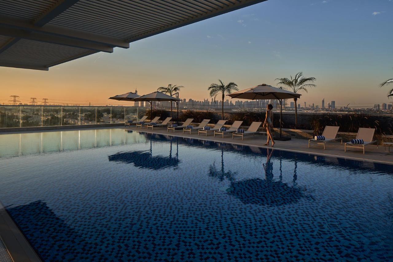Movenpick Jumeirah Village Triangle Dubai Luaran gambar The rooftop pool at the hotel