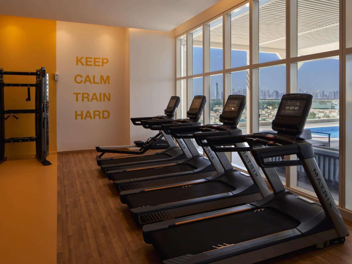 Movenpick Jumeirah Village Triangle Dubai Luaran gambar The gym at the hotel