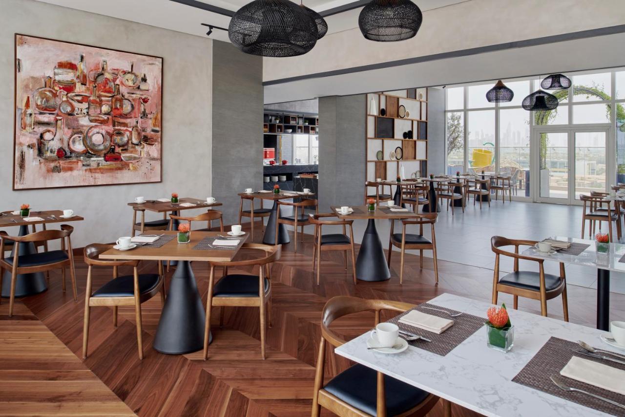 Movenpick Jumeirah Village Triangle Dubai Luaran gambar The restaurant
