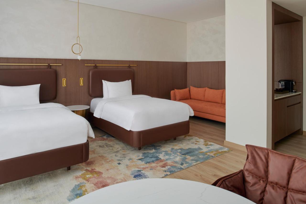 Movenpick Jumeirah Village Triangle Dubai Luaran gambar A room at the hotel